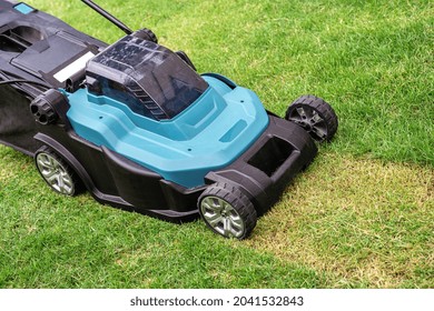 Lawn Mover Machine Cut Green Grass, Hobby Planting Home Garden.