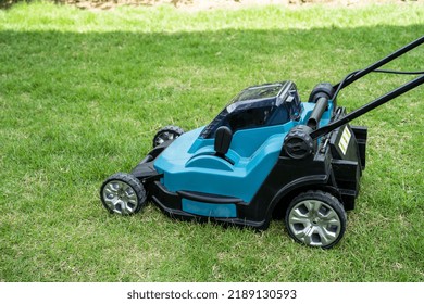 Lawn Mover Machine Cut Green Grass, Hobby Planting Home Garden.