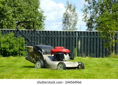 Lawn Mover On A Grass.