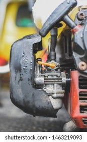 The Lawn Mower Carburetor Is Placed On The Car.