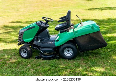 Lawn Mower On The Green Lawn