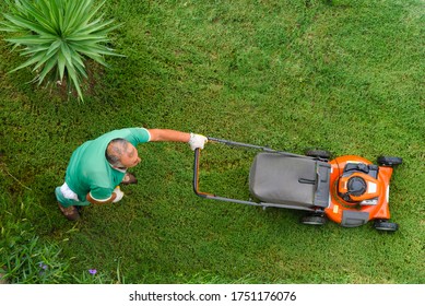 Lawnmover Worker Cutting Green Grass Garden Care Above View