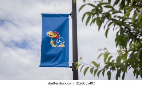 Lawrence, Kansas - May 22, 2022: The University Of Kansas Jayhawks' Logo On Banner At College Campus