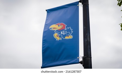 Lawrence, Kansas - May 22, 2022: The University Of Kansas Jayhawks' Logo On Banner At College Campus