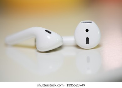 Lawrence Township New Jersey, March 11, 2019:Apple AirPods wireless Bluetooth headphones and charging case for Apple iPhone. New Apple Earpods Airpods in box. - Image