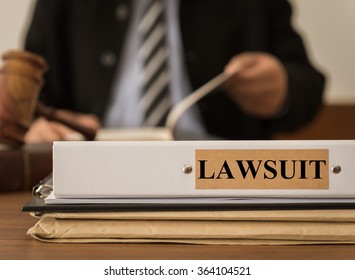 Lawsuit Document File With Lawyer Work At Law Firm. Legal Consulting Concept.