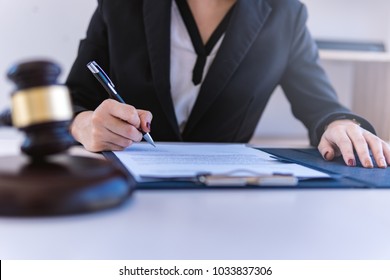 Lawyer business women working and notary signs the documents at office. consultant lawyer, justice and law ,attorney, court judge, concept. 