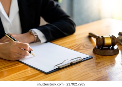 Lawyer Business Women Working And Notary Signs The Documents At Office. Consultant Lawyer, Justice And Law ,attorney, Court Judge, Concept.