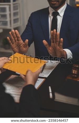 Lawyer or businessman is refusing and opposing the partner's bribery agreement in a joint financial deal. Concepts against illegal bribery in the workplace.