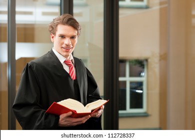 Lawyer With Civil Law Code In A Court Room