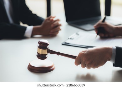 Lawyer concepts to testify to clients and to provide counseling in cases, to provide legal relief, to maintain law and fairness, to proceed with transparency, to attorneys to defend cases in court. - Shutterstock ID 2186653839