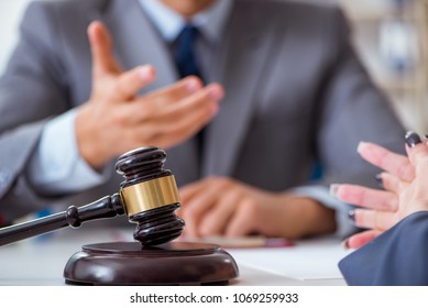 Lawyer Discussing Legal Case With Client