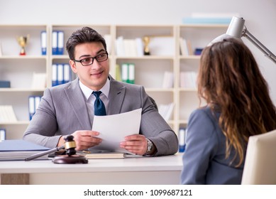 Lawyer discussing legal case with client - Shutterstock ID 1099687121