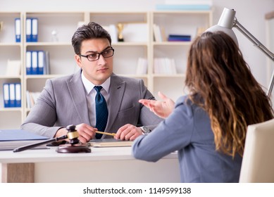Lawyer discussing legal case with client - Shutterstock ID 1149599138
