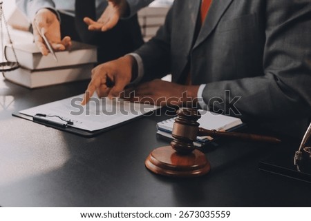 Lawyer explained to the client about the law that must be brought against the court case.