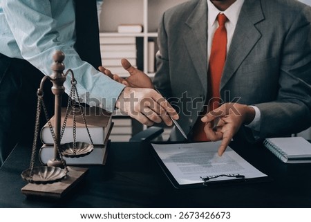 Lawyer explained to the client about the law that must be brought against the court case.