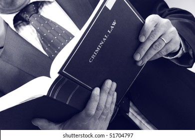 Lawyer Holding Criminal Law Book, Law Concept , Blue Toned