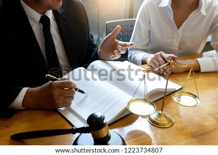 Lawyer or judge gavel with balance work with client or customer about agreement how to  use arbitration 
