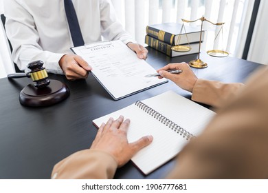 Lawyer Or Judge Present Client With Contract Document Papers, Law And Legal Services Concept.