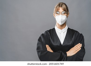 Lawyer Or Judge Wearing N95 FFP2 An Anti Virus Protection Mask To Prevent Others From Corona COVID-19 And SARS Cov 2 Infection. Law And Justice Concept Image