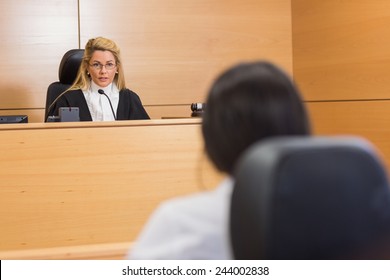 Lawyer Listening To The Judge In The Court Room