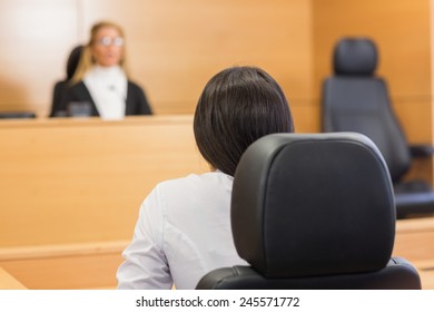 Lawyer Listening To The Judge In The Court Room