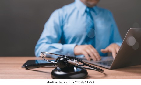 The lawyer meticulously reviews medical records while prosecuting a lawsuit against the hospital, ensuring adherence to law, and seeking justice for the client's medical malpractice claim. Homework - Powered by Shutterstock