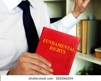 The Lawyer offers a book fundamental rights. - Shutterstock ID 1832066554