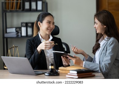 Lawyer Office. Statue Of Justice With Scales And Lawyer Working On A Laptop. Legal Law, Advice And Justice Concept.