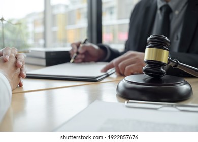 Lawyer Preparing To Sign A Contract And Wooden Gavel On Table Justice And Law Concept

