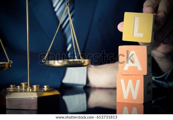 Lawyer Puts Law Word Attorney Lawyer Stock Photo (Edit Now ...
