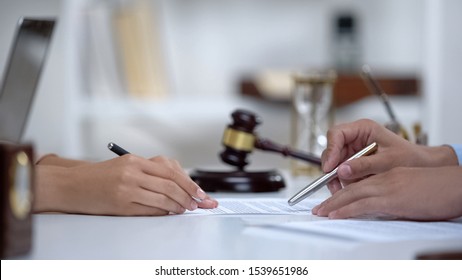 Lawyer Showing Woman Where To Sign Court Claim, Professional Help To Plaintiff