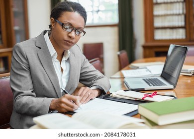 Lawyer taking notes in chambers