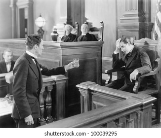 Lawyer And A Witness In A Courtroom