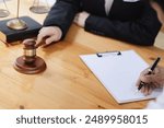 lawyer working with contract papers and wooden gavel at desk in courtroom, wooden gavel, a wooden legal gavel on an office desk, Judge gavel, Law,