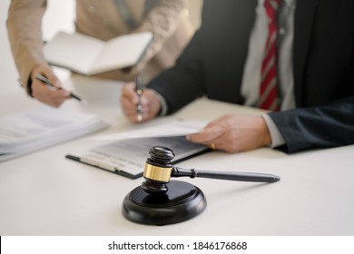 Lawyer Working With Lawsuit In Courtroom, Criminal And Judgement Concept.