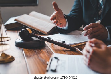 Lawyers give advice about judgment, agreements, justice Customer - Shutterstock ID 1710474016