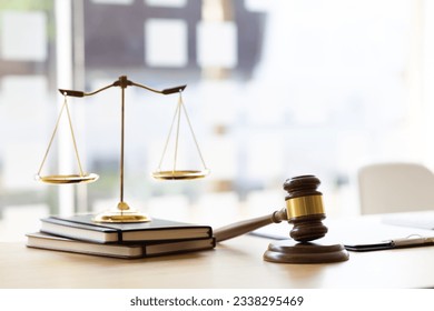 Lawyer's hammer and scales of legal justice. - Powered by Shutterstock