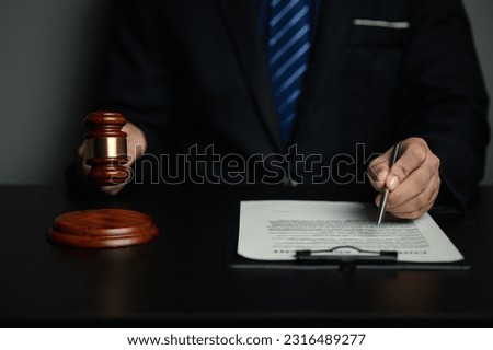 Lawyers, lawyers in the office and legal documents for use in arguing and planning cases for clients to win the case. Lawyer concept upholding the law and assisting clients in legal cases.