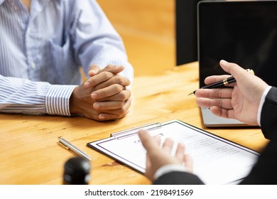 Lawyer's Signing Of The Contract Documents The Legal Action Agreement.