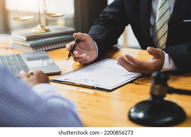 Lawyer's Signing Of The Contract Documents The Legal Action Agreement.