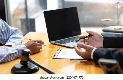 Lawyer's Signing Of The Contract Documents The Legal Action Agreement.