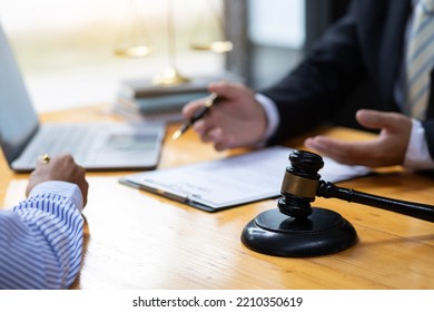 Lawyer's Signing Of The Contract Documents The Legal Action Agreement.