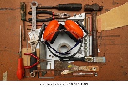 A Lay Flat Arrangement Of Used Tools. Manual Arts And Trade Related Building And Home Handyman Tools. Equipment For A Tradesperson In A Abstract Design.