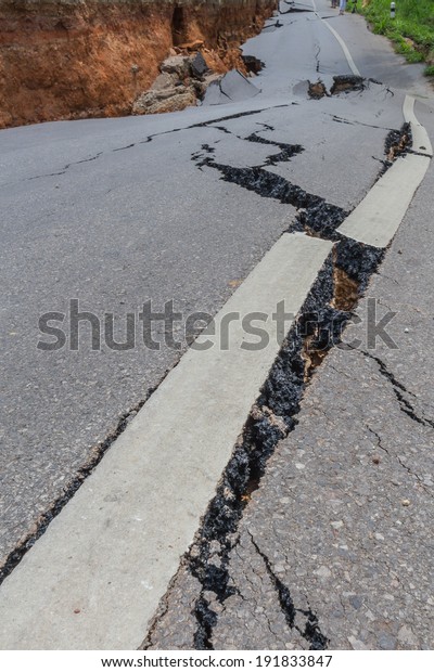 layer of broken\
asphalt road at rural\
areas