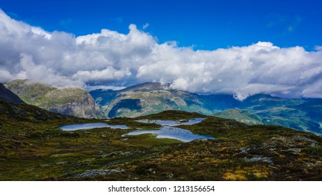 Layer cake of sky, mountains and clouds