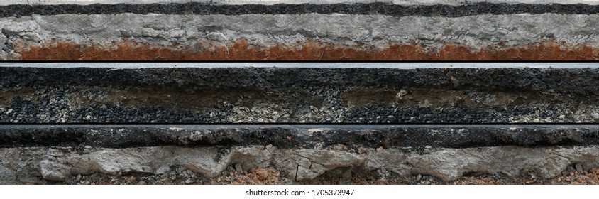 Layered asphalt road side texture with soil geology cross section underground earth, cutaway tar road  terrain surface - Shutterstock ID 1705373947