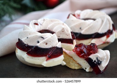 Layered Dessert - Delicate Souffle And Fruit Jelly On Pastry Bathed In White Chocolate. Festive Cake With Currant Flavor, In The Form Of Rings.