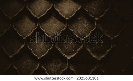Layered scaly pattern architectural background or dark brown black gradient roof tile pattern. For Backdrop Art Crop Thai beauty design abstract color decoration creative symbol card silhouette