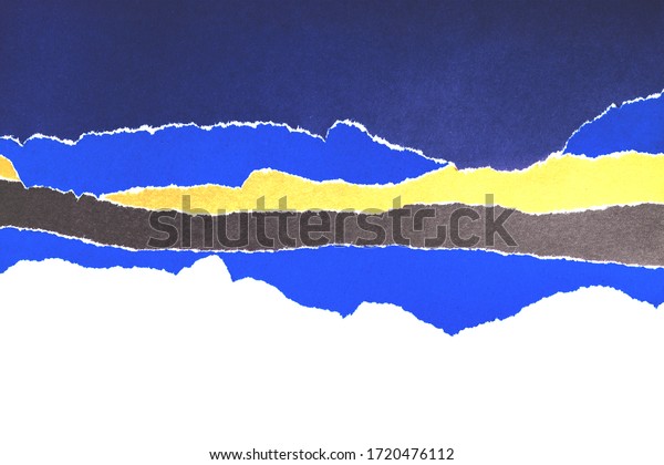 \
Layers of colored paper with torn edges.\
Abstract blue\
background